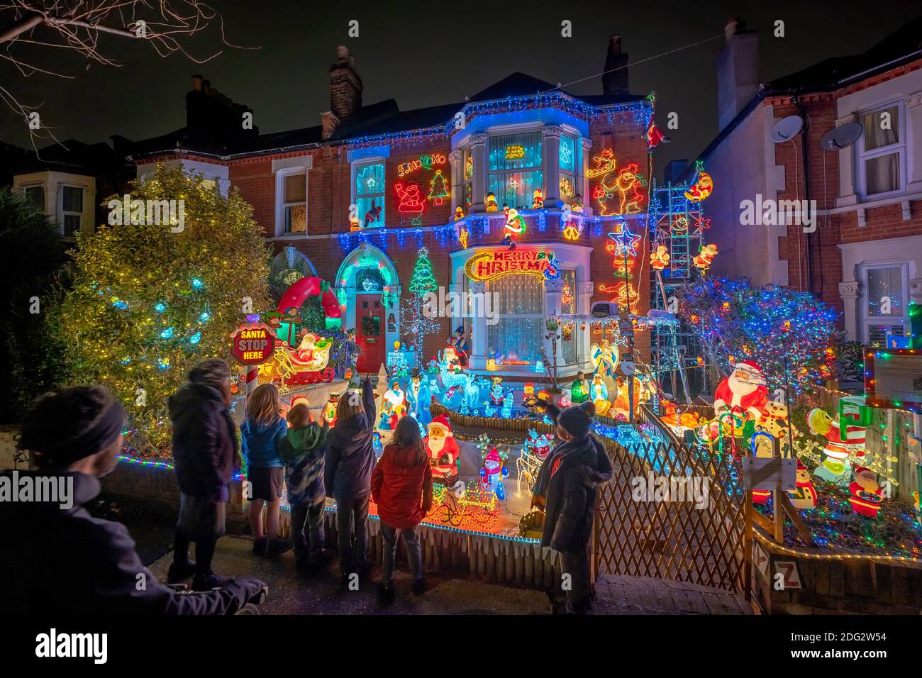 London, UK. 7th Dec 2020. Spectacular Christmas house lights display in Lewisham. For the past 15 Christmases, Garry Leach and his family spend around two months transforming the front garden in Birkhall Road, Catford, into a winter wonderland in aid of St Christopher’s Hospice and other local charities. Credit: Guy Corbishley/Alamy Live News Stock Photo