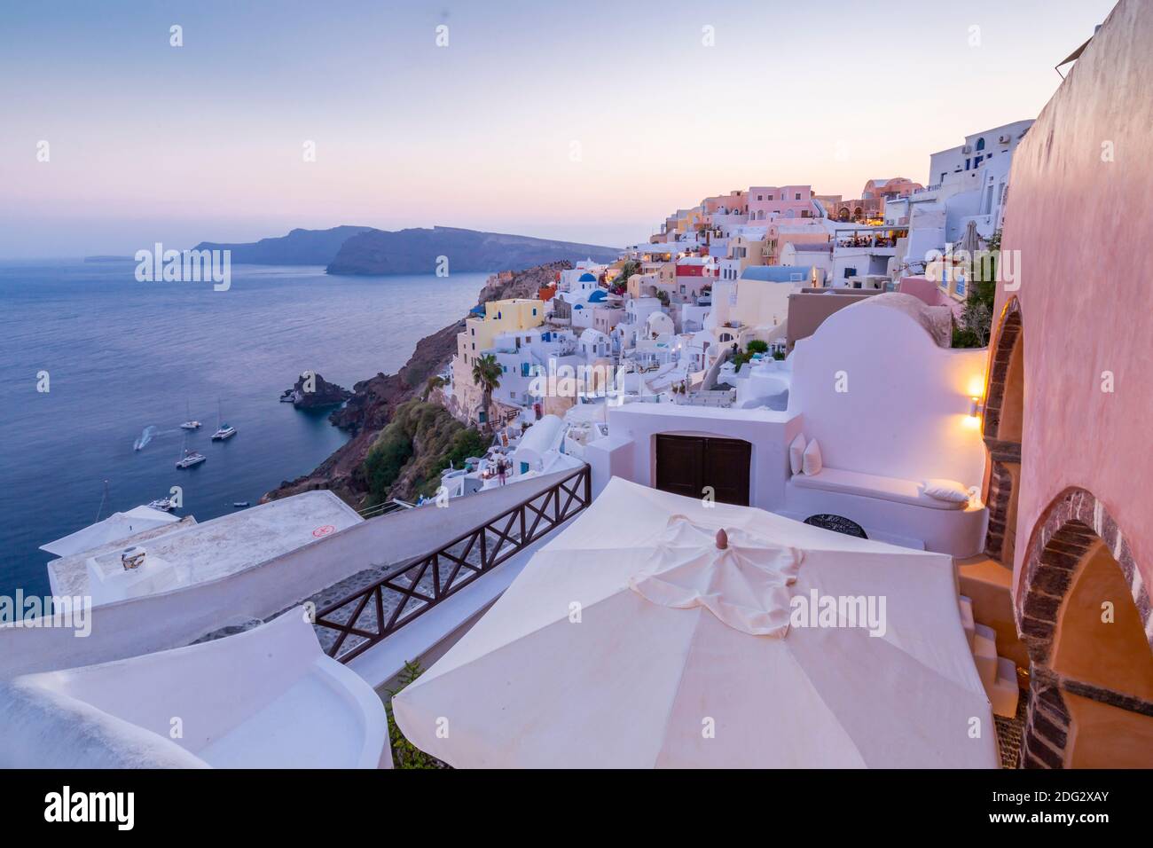 View of Oia village at dusk, Santorini, Aegean Island, Cyclades Island, Greek Islands, Greece, Europe Stock Photo