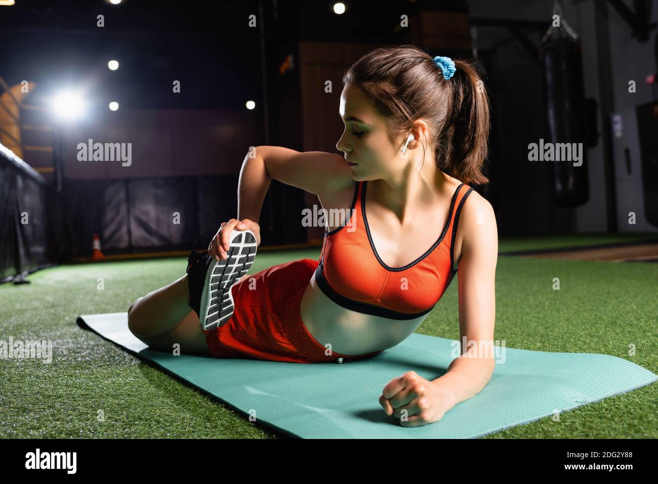 Beautiful woman gym lying on hi-res stock photography and images
