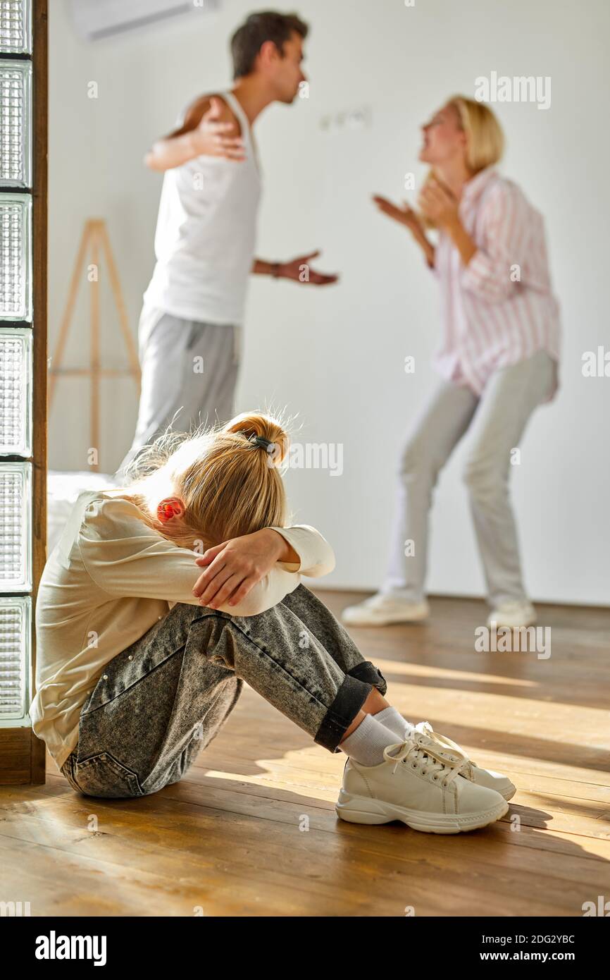 girl is frustrated with psychological problems caused by mom and dad