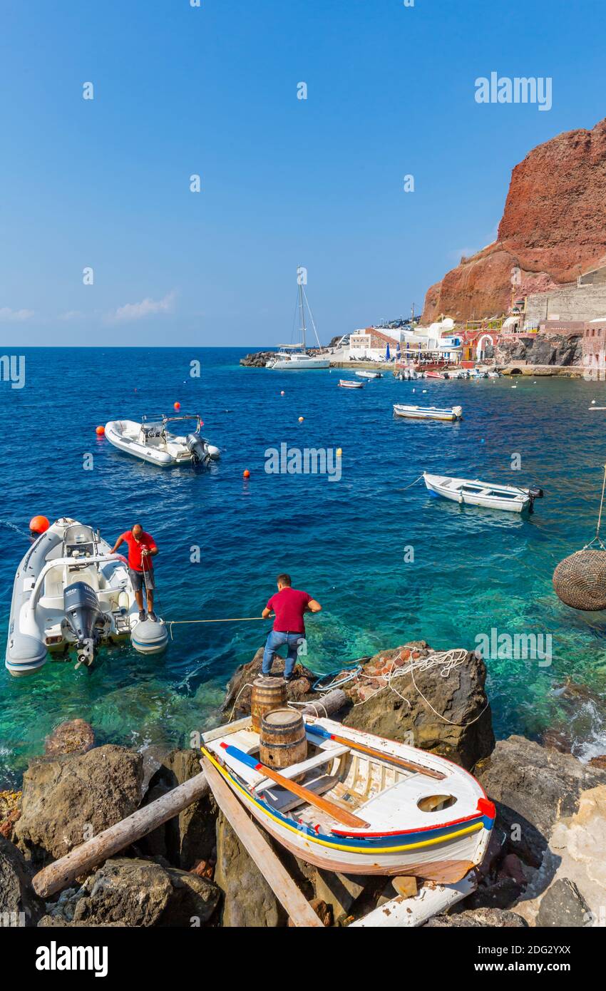 View of little harbour and cliff top Oia village, Santorini, Aegean Island, Cyclades Island, Greek Islands, Greece, Europe Stock Photo