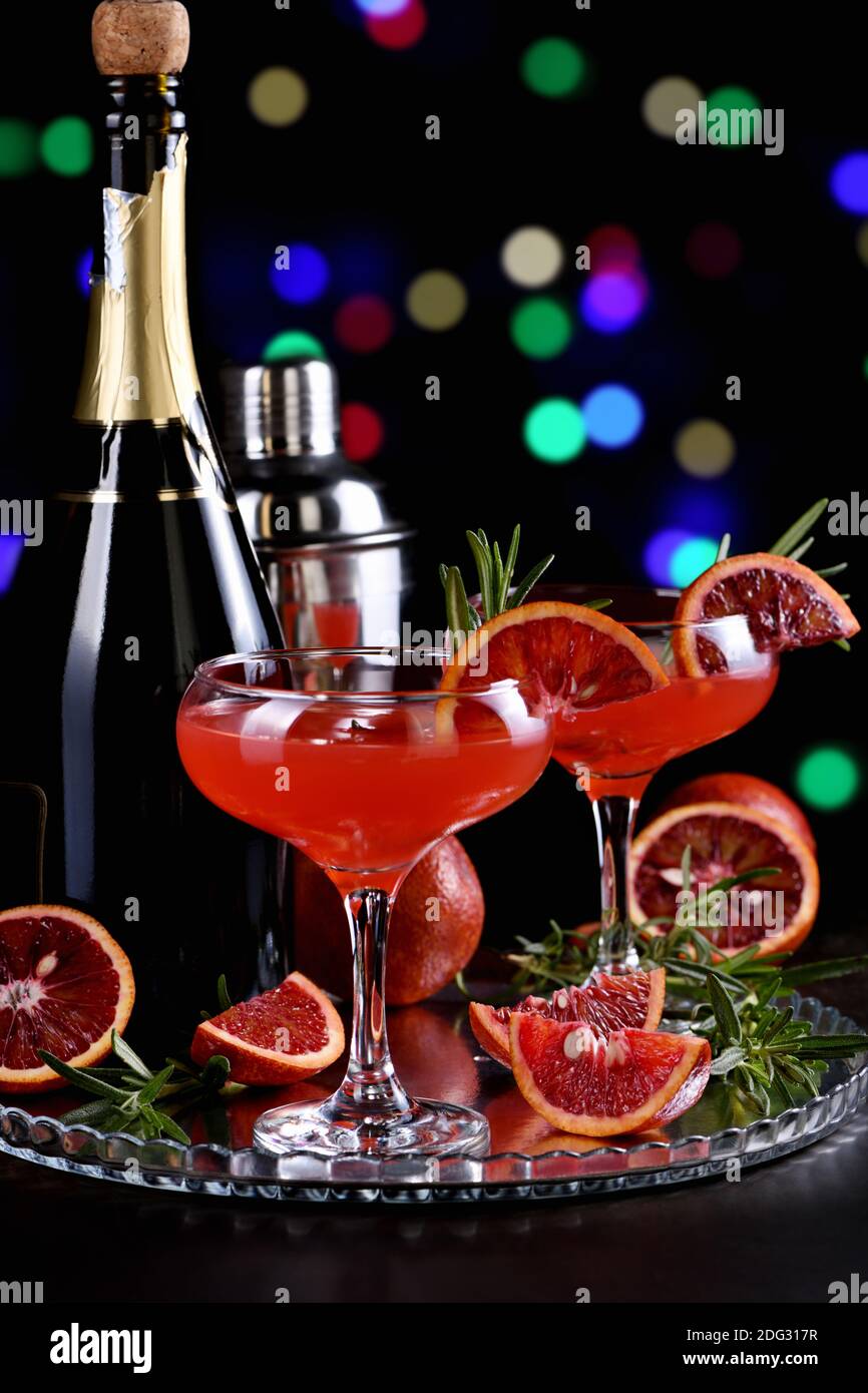 Bloody orange citrus champagne cocktail. Delicious, classy drink that everyone at your party will love Stock Photo