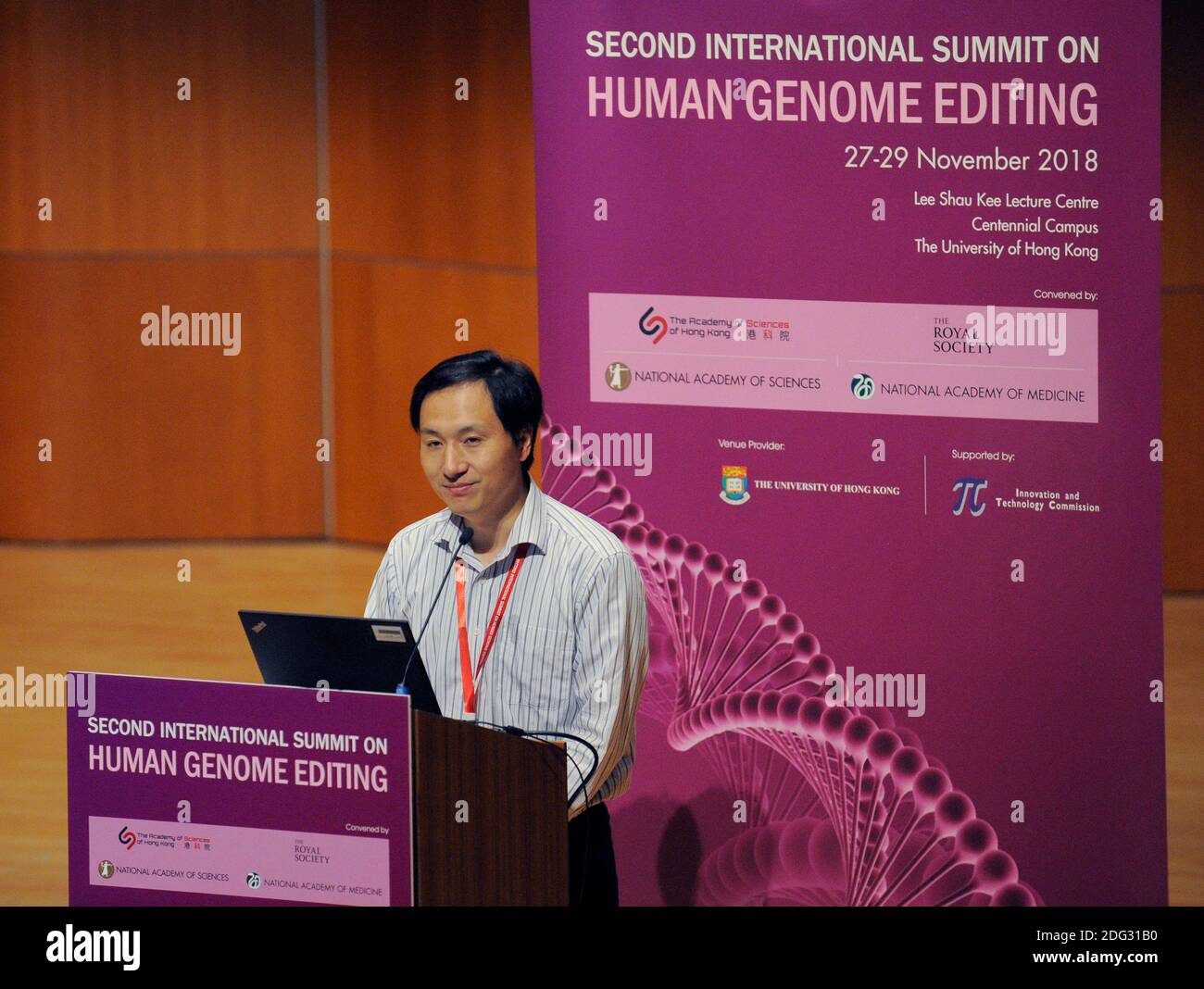 Chinese biologist He Jiankui gives a presentation at Hong Kong University during the Second International Summit on Humane Genome Editing. He had biologically altered the genome of two twins in an attempt to make them resistant to AIDS, which their biological father had. He was condemned by the scientific community, and was taken into custody immediately after his talk and was eventually jailed. Stock Photo