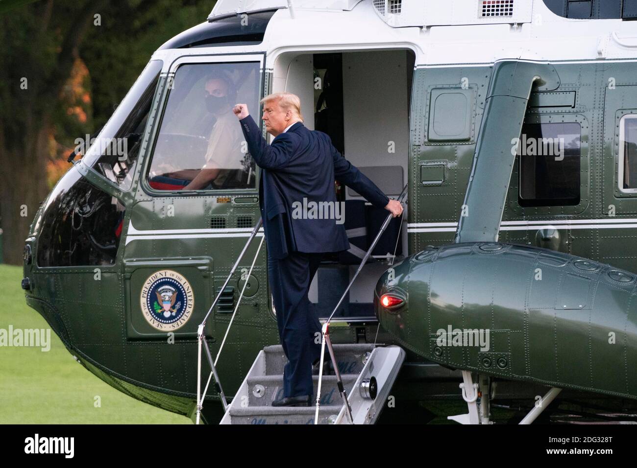 U.S. President Donald Trump boards Marine One as he departs the White House in Washington, DC, USA, 20 October 2020. Trump is scheduled to host a campaign rally in Erie, Pennsylvania before returning to the White House tonight. Credit: Alex Edelman/The Photo Access Stock Photo