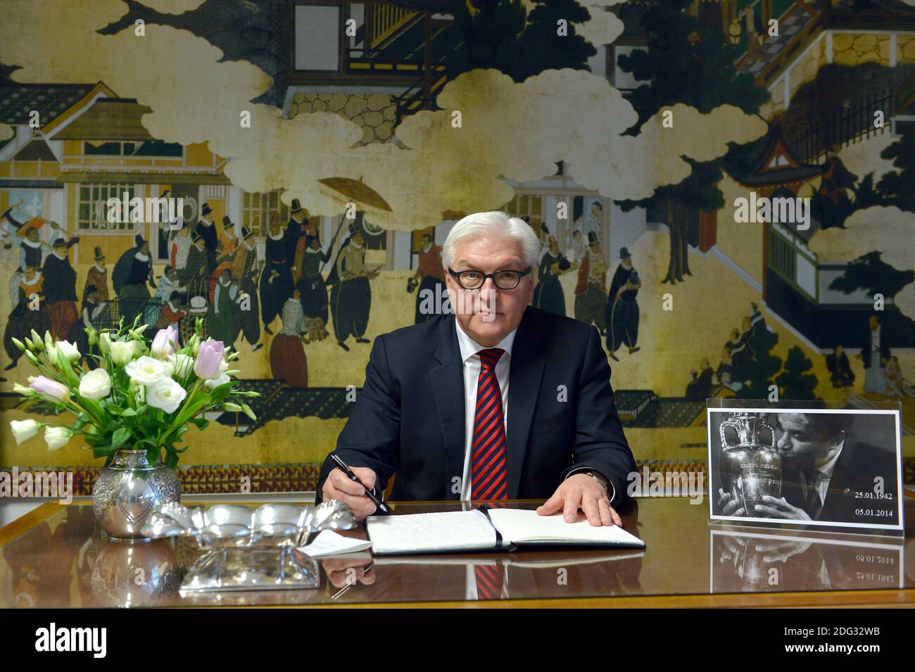 Steinmeier signs condolence book in memory of Portuguese EusÃ©bio. Stock Photo