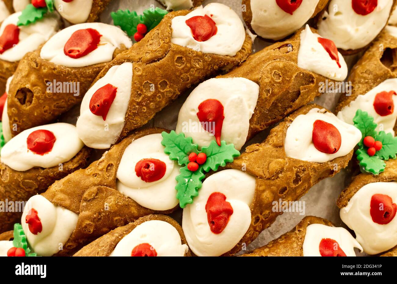 Assortment of Sicilian Cannoli with ricotta cheese. Cannolo Siciliano, symbol of Sicily. Traditional italian dessert Stock Photo