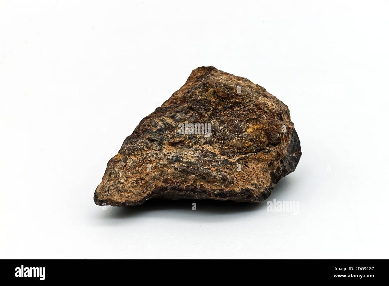 Chondrite Meteorite isolated on white background. Stock Photo