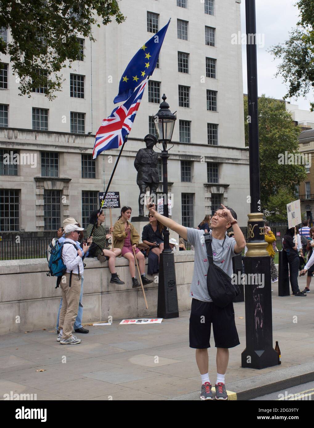 An anti Brexit protestor takes a selfie at a march Stock Photo
