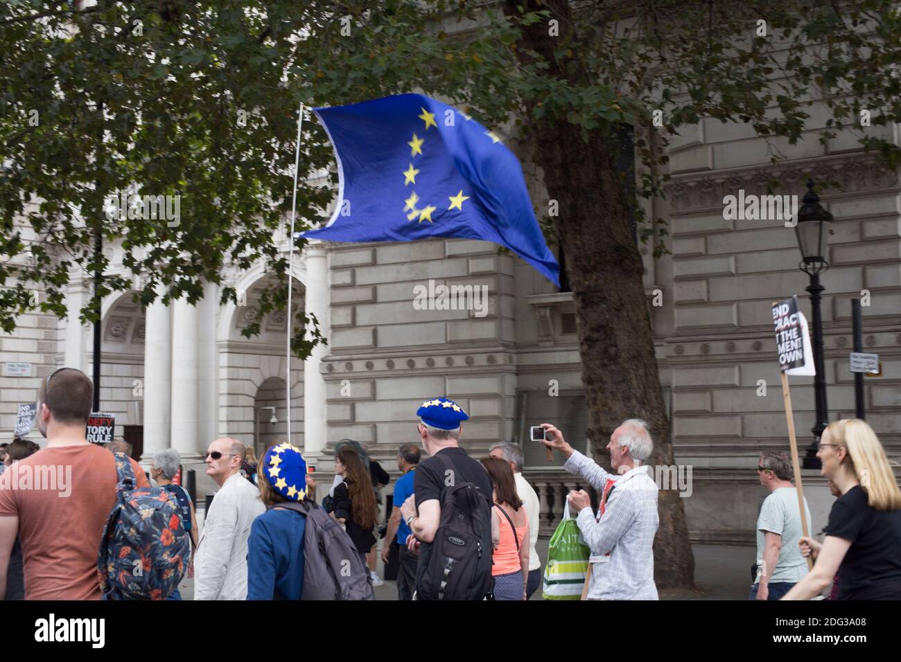 Anti-Brexit protestors marching with a European Union flag Stock Photo