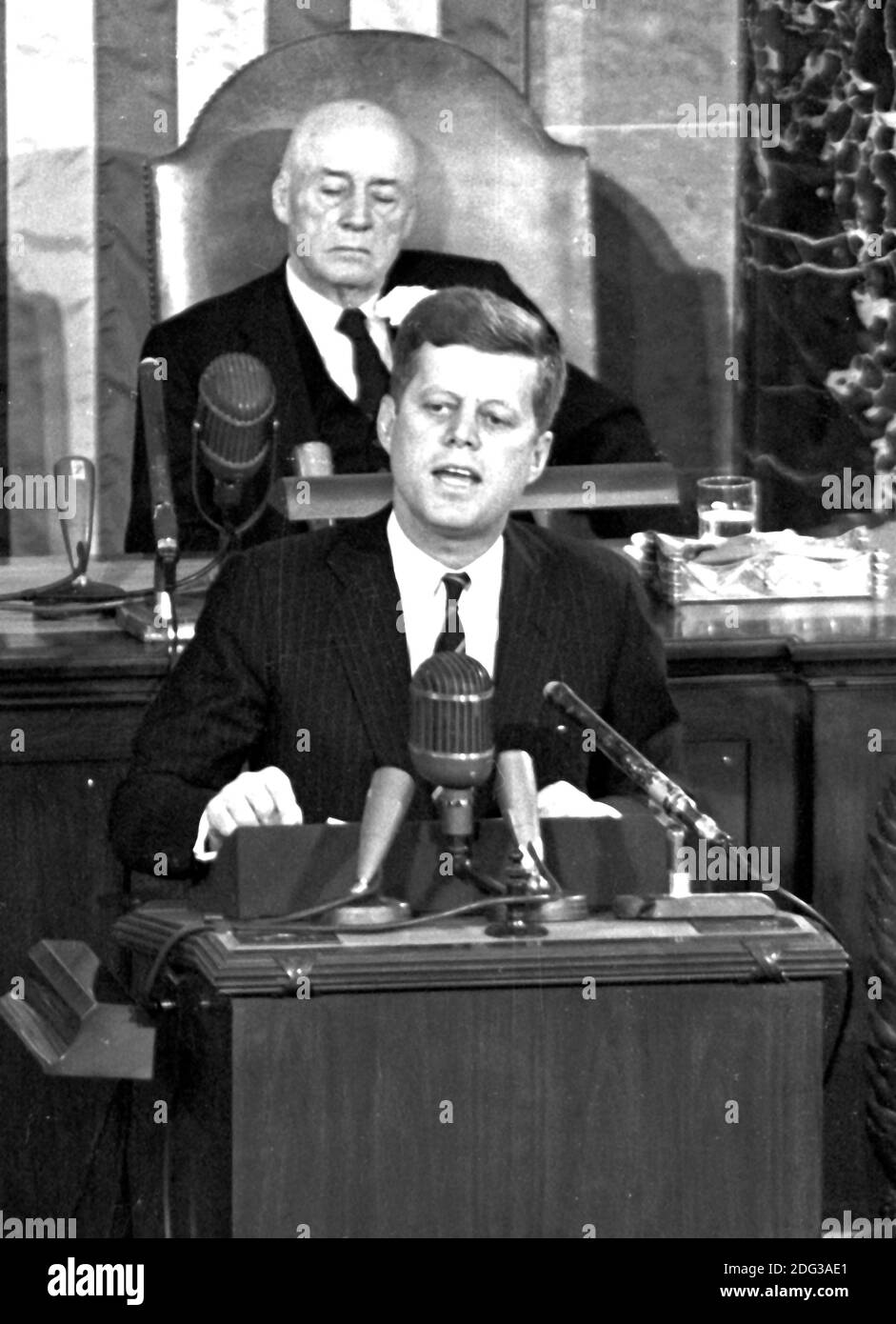 United States President John F. Kennedy outlined his vision for manned exploration of space to a Joint Session of the United States Congress, in Washington, DC, USA, on May 25, 1961 when he declared, "...I believe this nation should commit itself to achieving the goal, before this decade is out, of landing a man on the Moon and returning him safely to the Earth." This goal was achieved when astronaut Neil A. Armstrong became the first human to set foot upon the Moon at 10:56 p.m. EDT, July 20, 1969. Shown in the background is Speaker of the House Sam T. Rayburn (Democrat of Texas). Photo by Ar Stock Photo