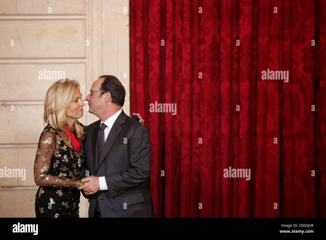 French President Francois Hollande awards US Ambassador to France Jane