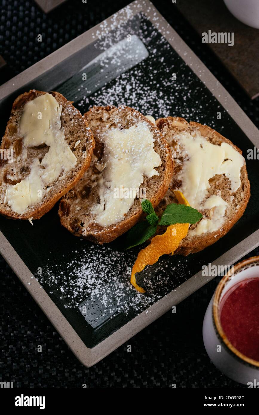 various desserts with tea on a black background Stock Photo