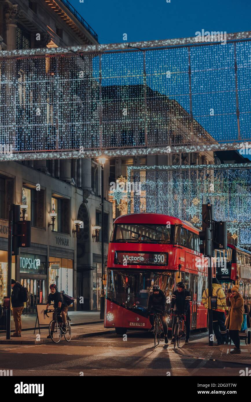 London, UK November 19, 2020 Buses and cyclists waiting on red light