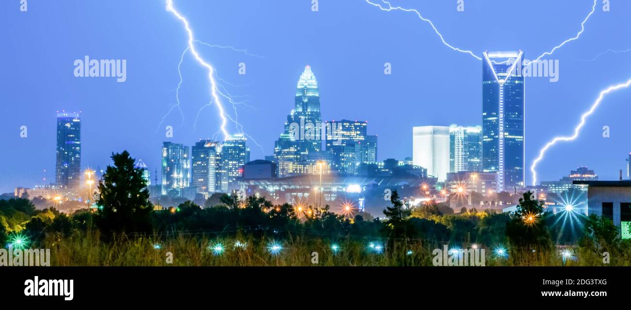 Thunderstorm lightning strikes over charlotte city skyline in north ...