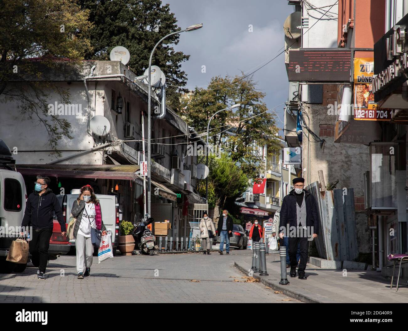 Sile, Turkey. 7th Dec, 2020. People walk in Sile, a small fishing town some 70 km from Istanbul, Turkey, on Dec. 7, 2020. The concerns with the COVID-19 pandemic are causing more and more residents in Turkey's largest city Istanbul to move to the city's remote seaside districts along the shores of the Black Sea and the Marmara Sea. Credit: Osman Orsal/Xinhua/Alamy Live News Stock Photo