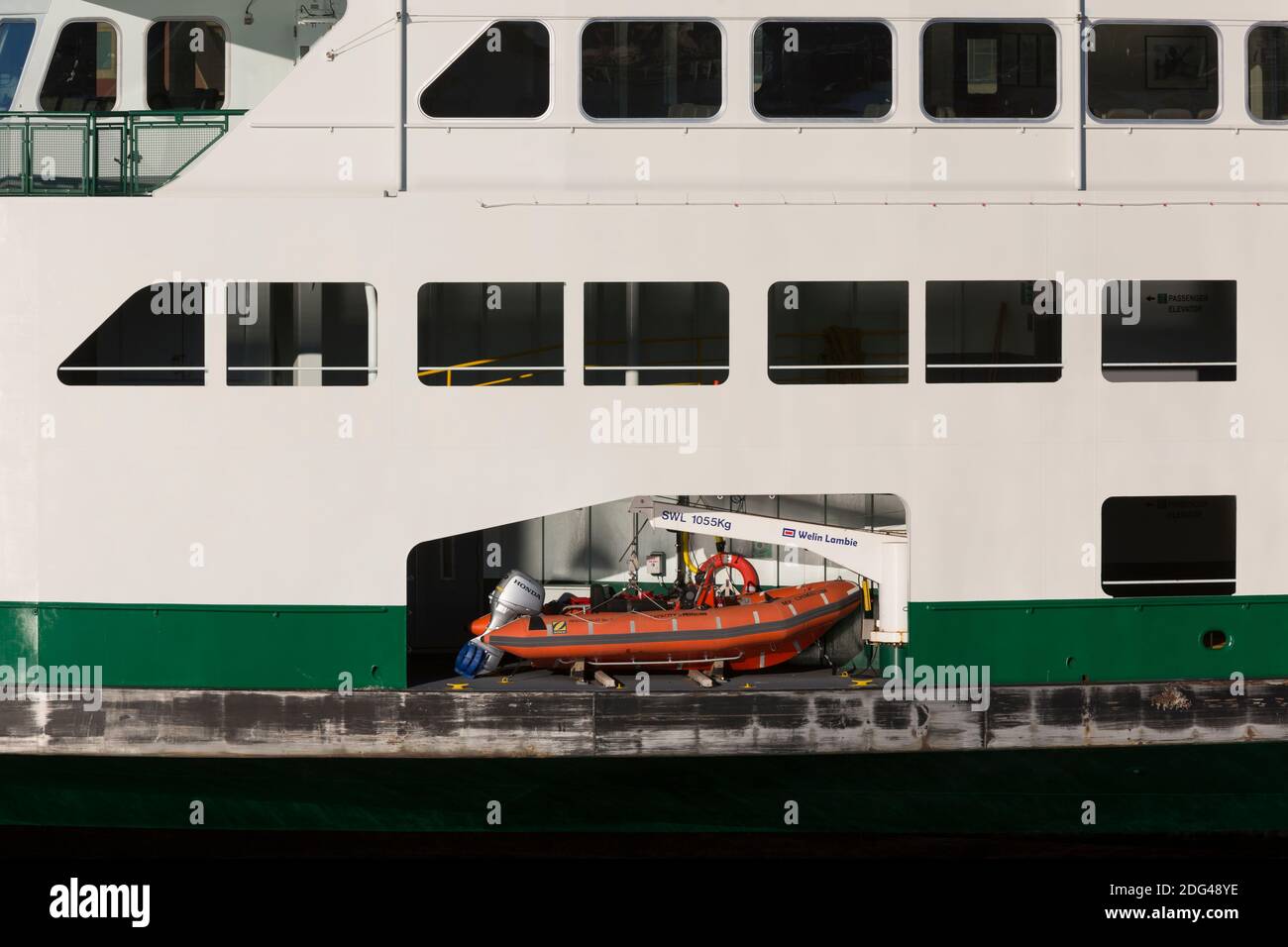 View of the M/V Chimacum ferry and its rescue boat while docked at the Seattle Ferry Terminal on Friday, December 4, 2020. Stock Photo