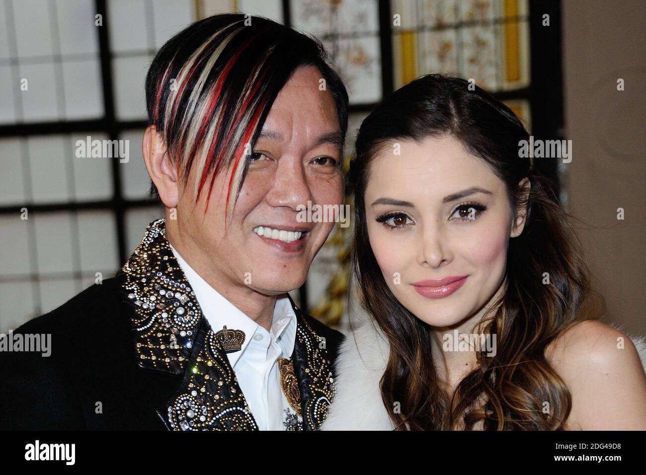 Stephen Hung and his wife Deborah Hung attending the Jean-Paul Gaultier