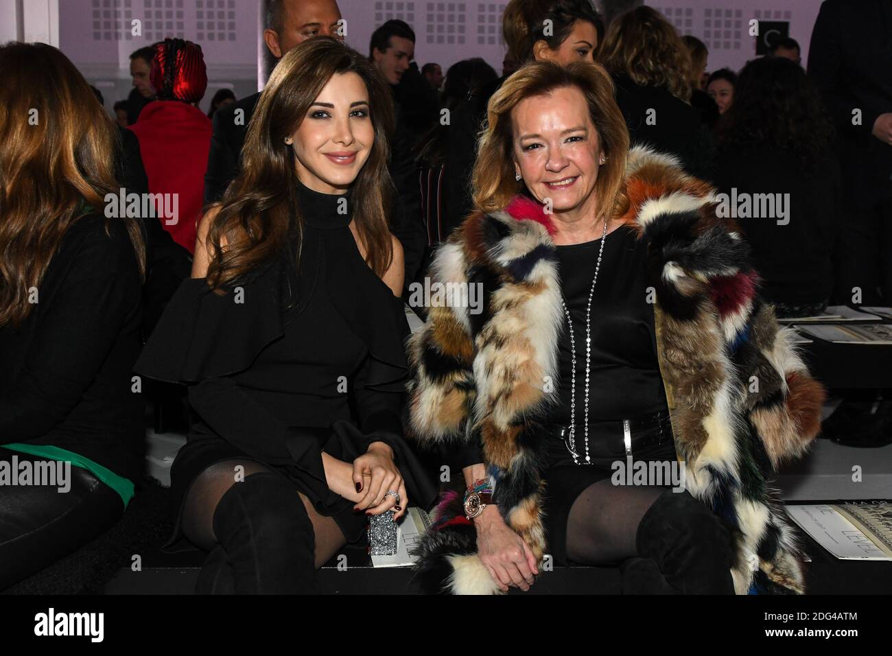 L-R : Nancy Ajram and Caroline Scheufele attend Lebanese designer Elie Saab Haute  Couture Spring - Summer 2017 show at Pavillon Cambon, in Paris, France, on  January 25, 2017, on 4th day