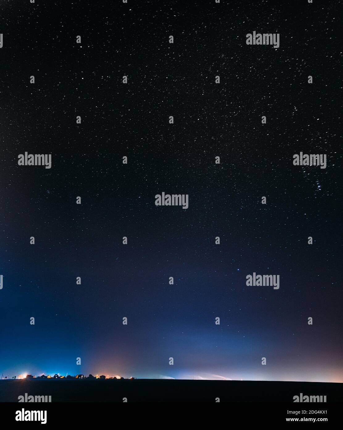 Night Starry Sky With Glowing Stars Above Countryside Town Landscape ...