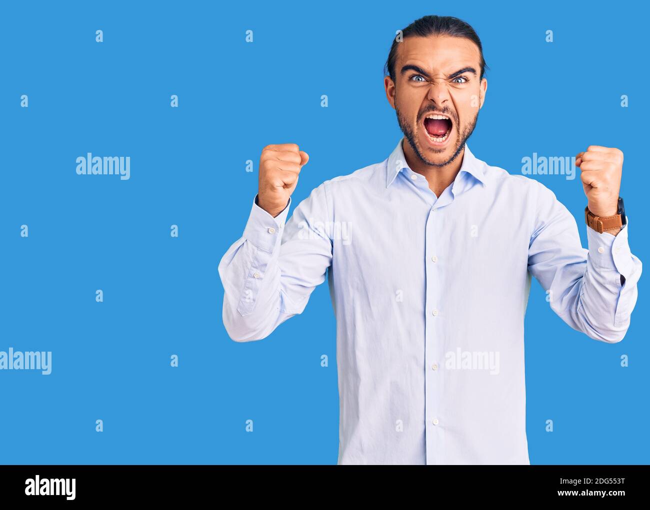 Guy Raging Stock Young handsome man wearing business clothes angry and mad raising fists ...