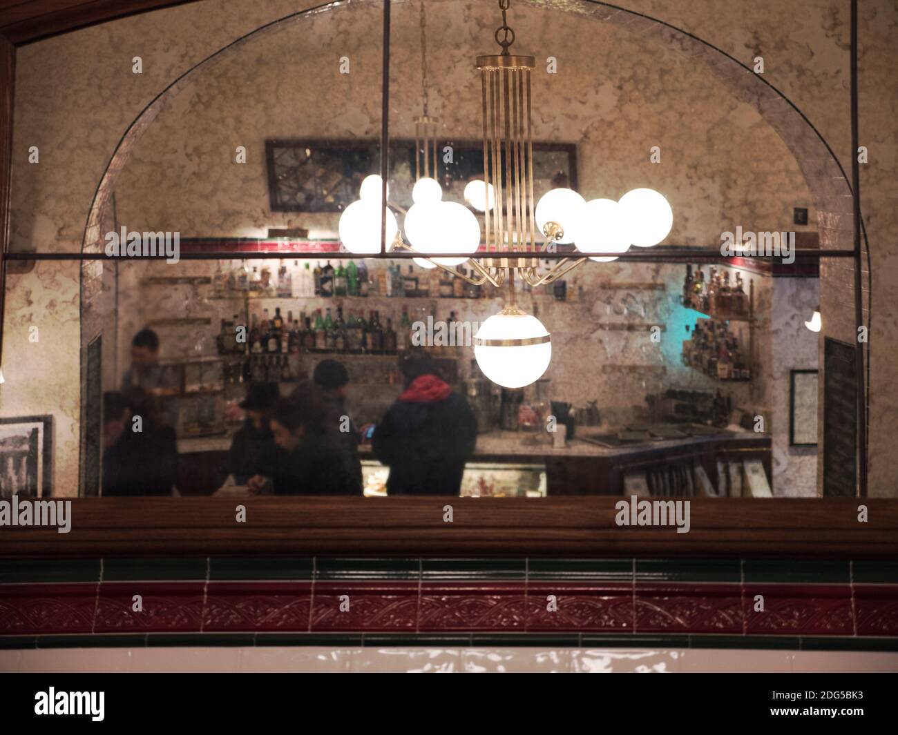 Cafe Interior Reflecting in the Mirror Stock Photo