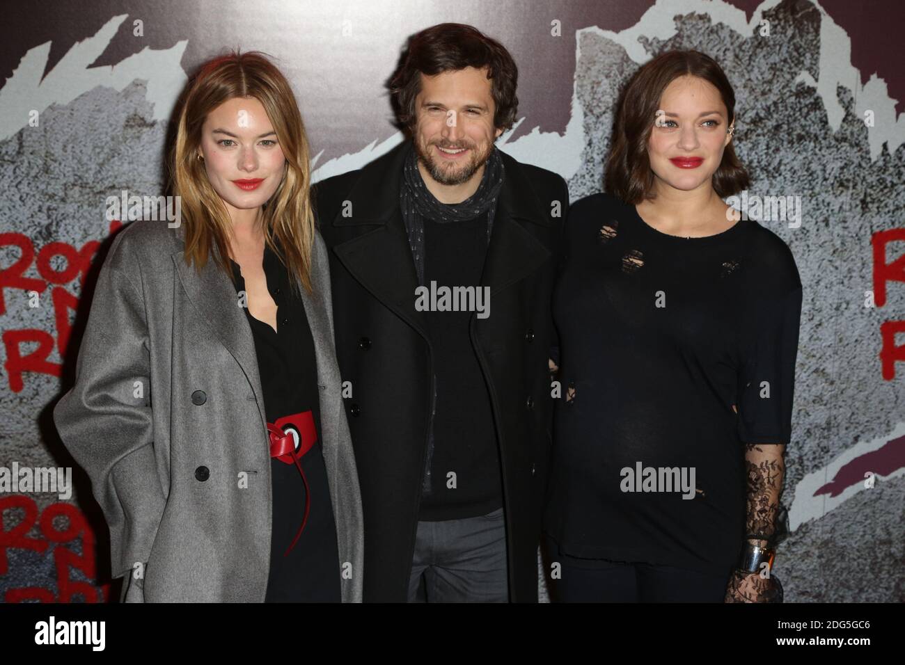 Camille Rowe, Guillaume Canet and his wife Marion Cotillard attending the Rock  N Roll Paris premiere