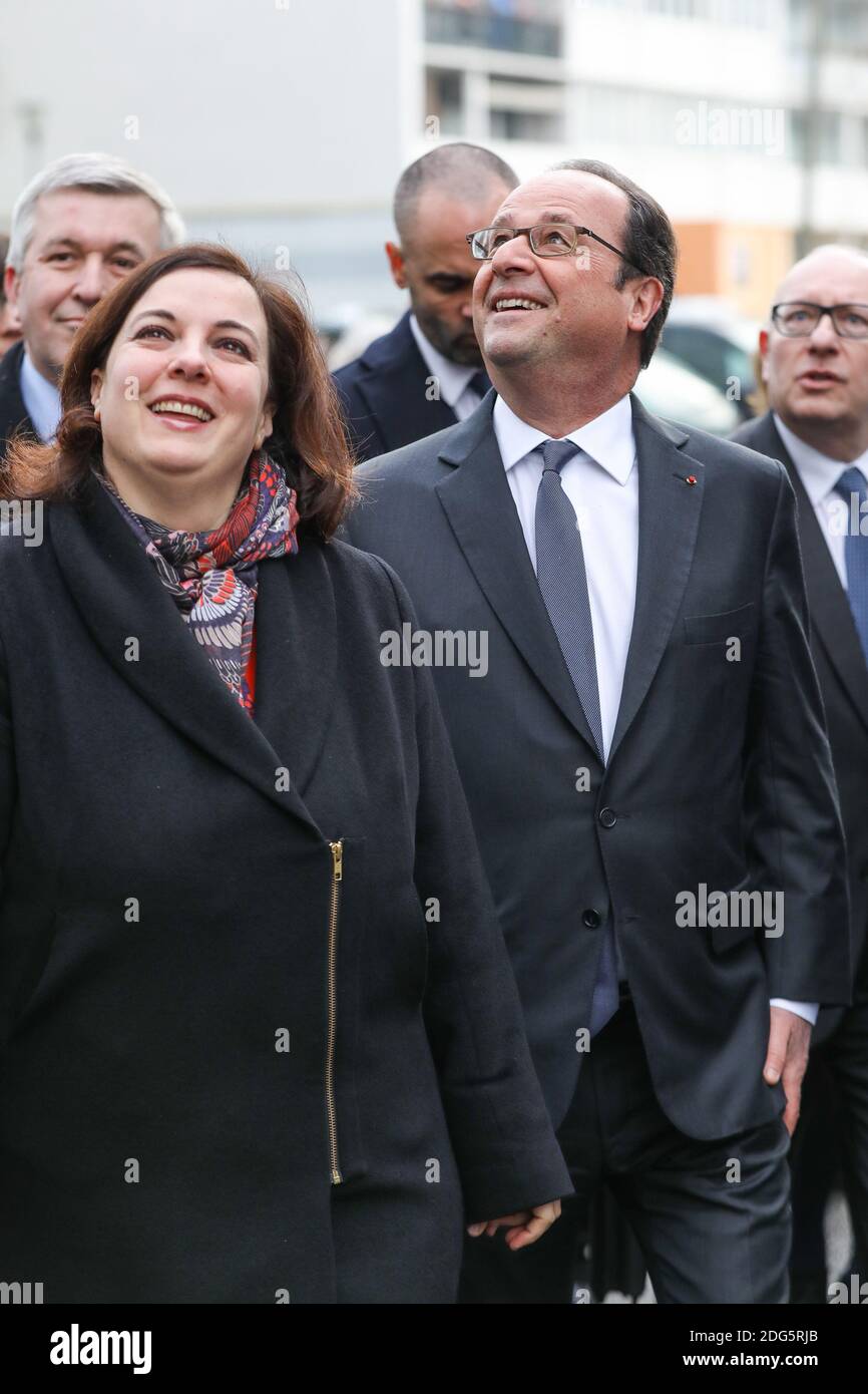 French President Francois Hollande Along With Minister Of Housing And Sustainable Homes Emmanuelle Cosse And Ivry Mayor Philippe Bouyssou During A Visit To The Development Zone Zac Du Plateau In Ivry Sur Seine Near