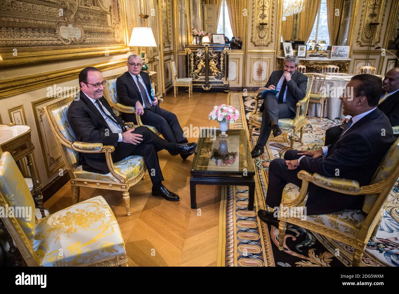 French President Francois Hollande (L) along with his Diplomatic Advisor Jacques Audibert (2nd L) receives Indian business magnate and Reliance Group chairman Anil Ambani (R) at the Elysee Palace in Paris, France on February 21, 2017. Photo by Hamilton/Pool/ABACAPRESS.COM Stock Photo