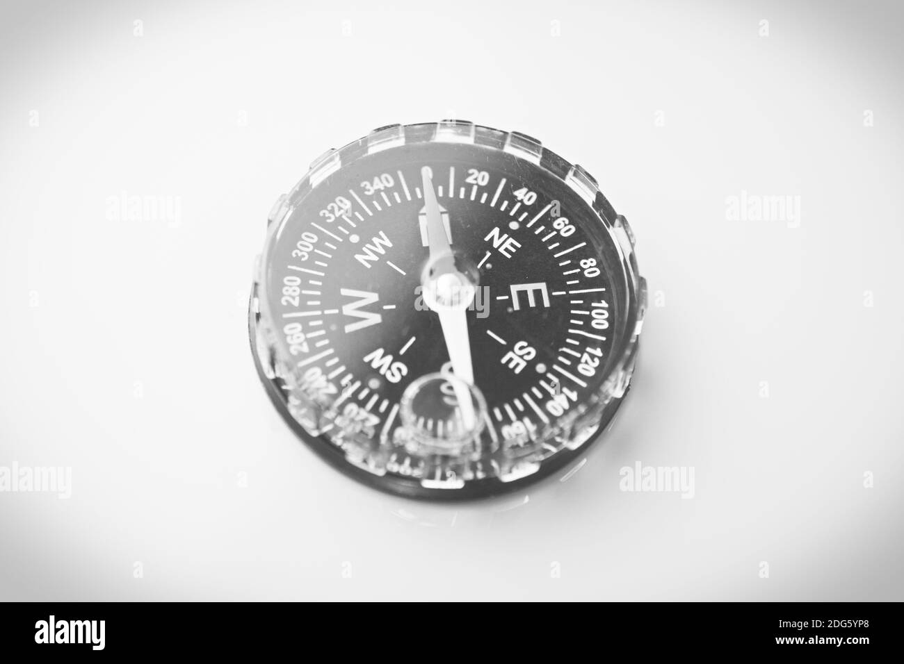 compass on a turquoise background Stock Photo