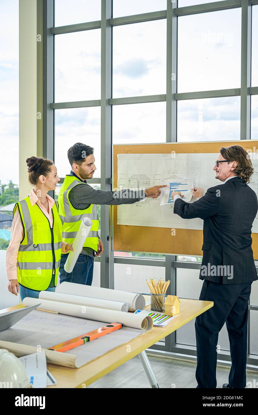 Group of Caucasian engineer teamwork meeting for planning project. Corporation creativity people. Stock Photo