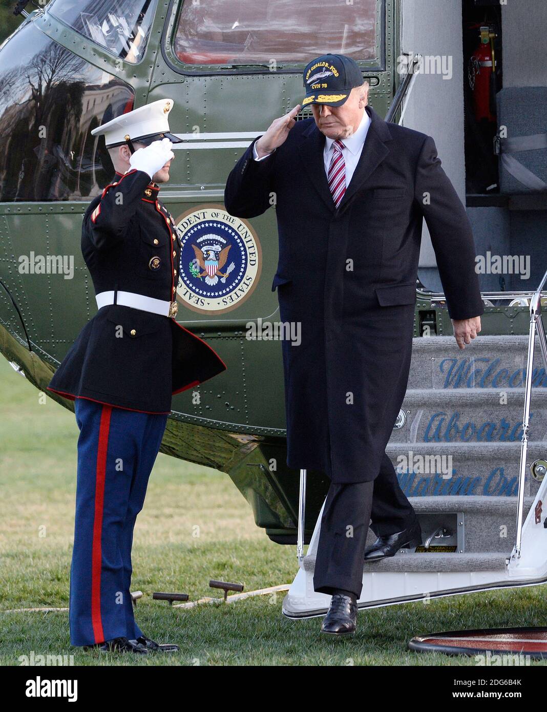 U.S. President Donald J. Trump walks back to the Oval Office as he ...