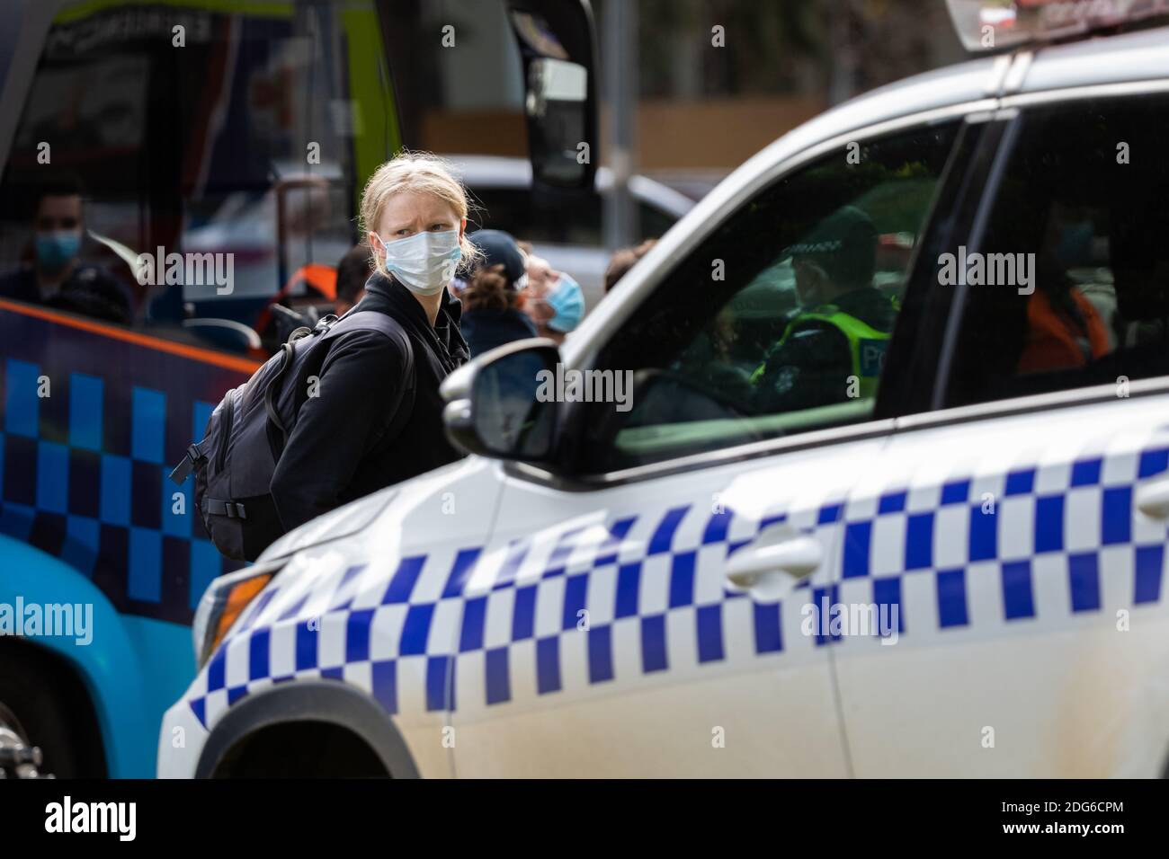 Melbourne, Australia, 5 July, 2020.  A concerned relative of one of the residents of 120 Racecourse Road is seen trying to enter the property but is turned away by police amid a full and total lockdown of 9 housing commission high rise towers in North Melbourne and Flemington during COVID 19 on 5 July, 2020 in Melbourne, Australia. After 108 new cases where uncovered overnight, the Premier Daniel Andrews announced on July 4 that effective at midnight last night, two more suburbs have been added to the suburb by suburb lockdown being Flemington and North Melbourne. Further to that, nine high ri Stock Photo