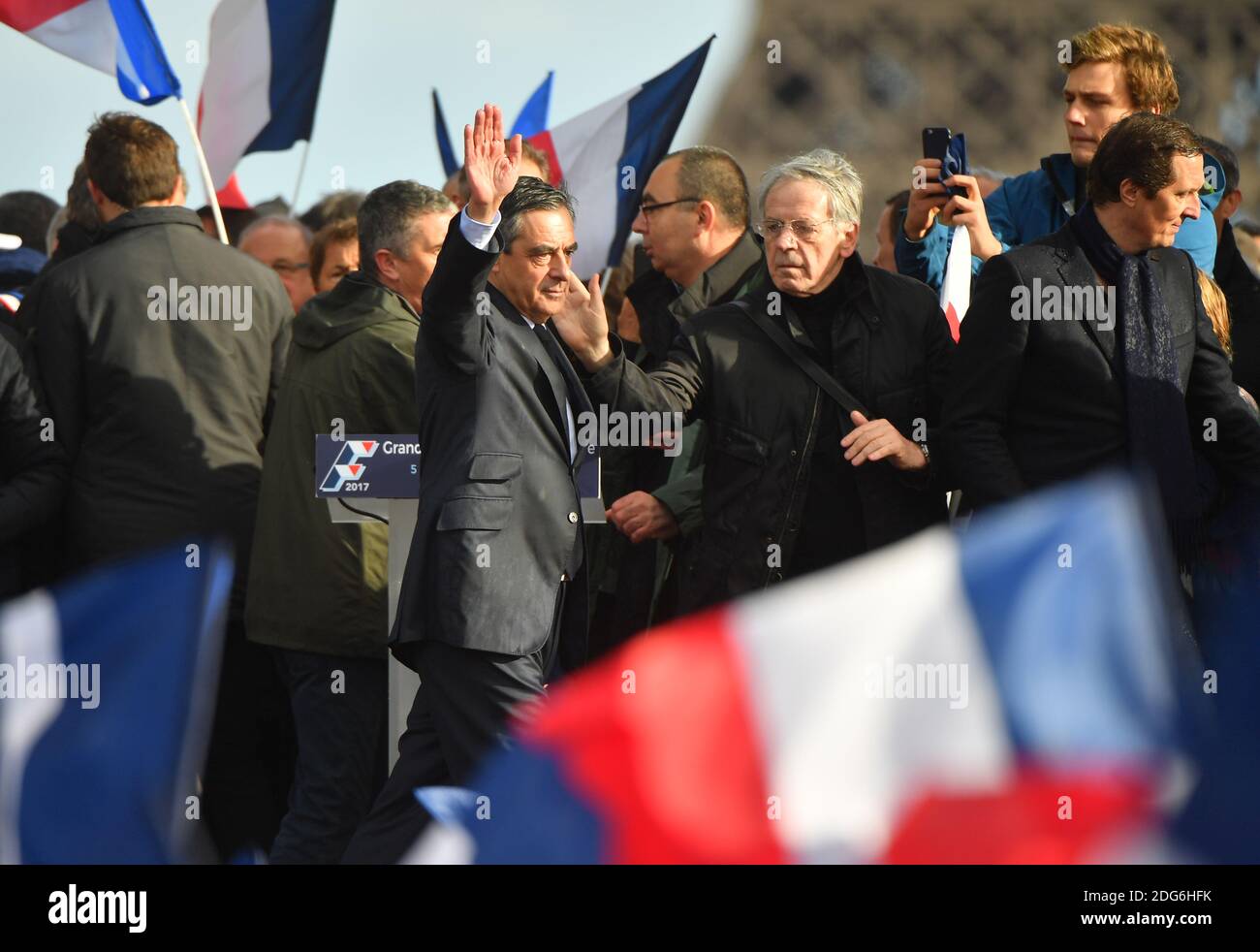 Presidential election candidate for the right-wing Les Republicains (LR) party Francois Fillon gestures during a rally at the Place du Trocadero, in Paris, France, on March 5, 2017. Embattled French conservative Francois Fillon told supporters to never give up the fight as he strivses to stay in the presidential election race amid an expenses scandal. Fillon, who is to be charged over claims he gave his wife and children highly-paid fake parliamentary jobs, told the rain-drenched crowd he had been attacked by everyone in the campaign. Photo by Christian Liewig/ABACAPRESS.COM Stock Photo