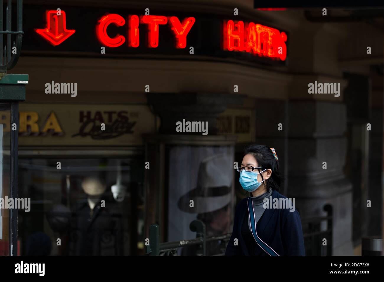 Melbourne, Australia, 21 September, 2020. A woman walks by the City Hatters store during COVID-19 in Melbourne, Australia. Victoria recorded only 11 new cases overnight and two deaths, despite this Premier Daniel Andrews continues to refuse to ease restrictions. Meanwhile Melbournians are suffering lockdown fatigue, businesses are closing and mental health is suffering an upsurge.Credit: Dave Hewison/Alamy Live News Stock Photo