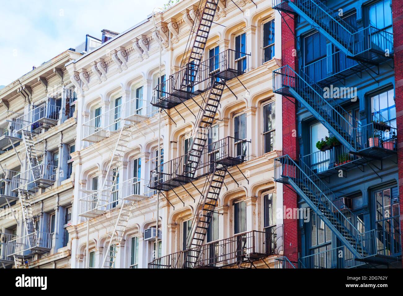 Old residential buildings with fire escape stairs in Soho, New York City Stock Photo