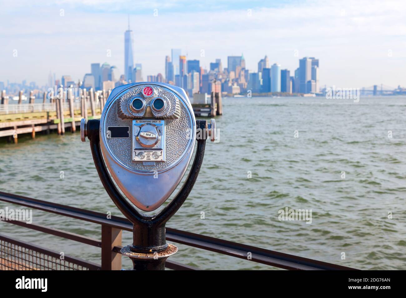 Antique binoculars on Liberty Island with view to Manhattan, New York City Stock Photo