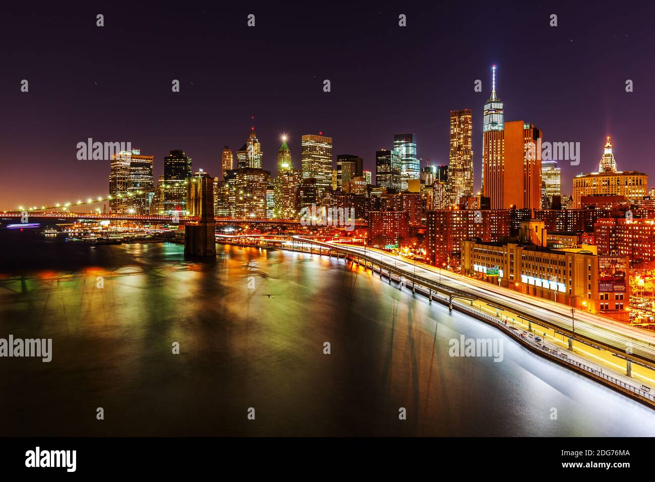 Skyline of downtown Manhattan with Brooklyn Bridge and East River in ...