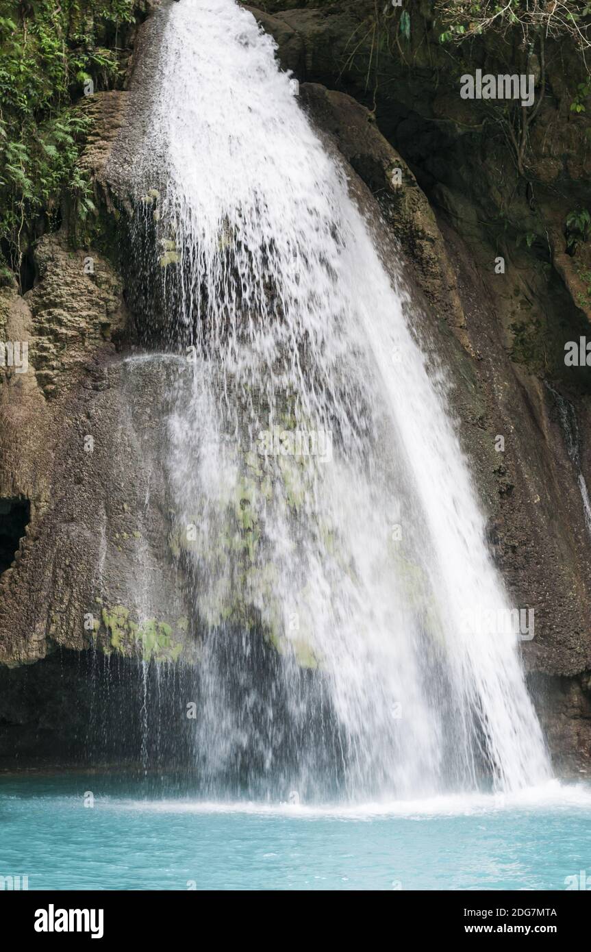 Waterfall in green jungle on the island of Cebu, Philippines. Stock Photo