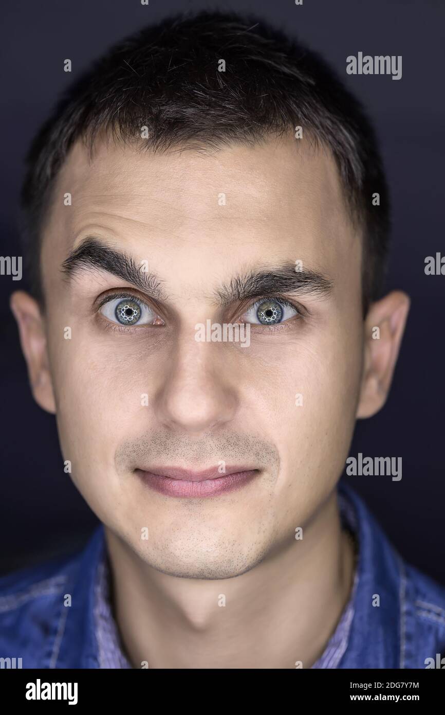 Close up young mans face hi-res stock photography and images - Alamy