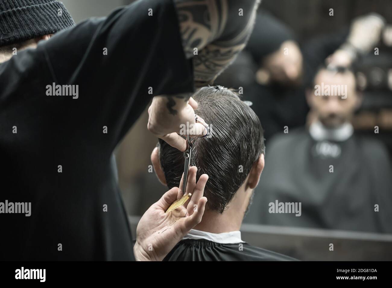Doing haircut in barbershop Stock Photo