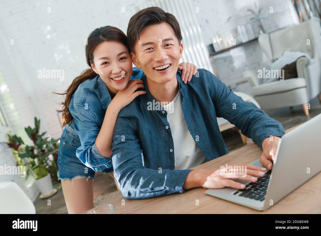 Happy young couples home office Stock Photo