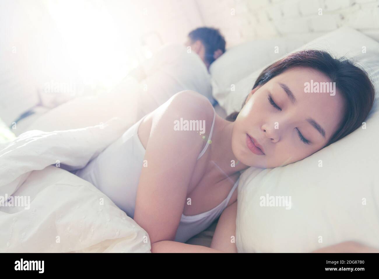 The young couple in bed Stock Photo