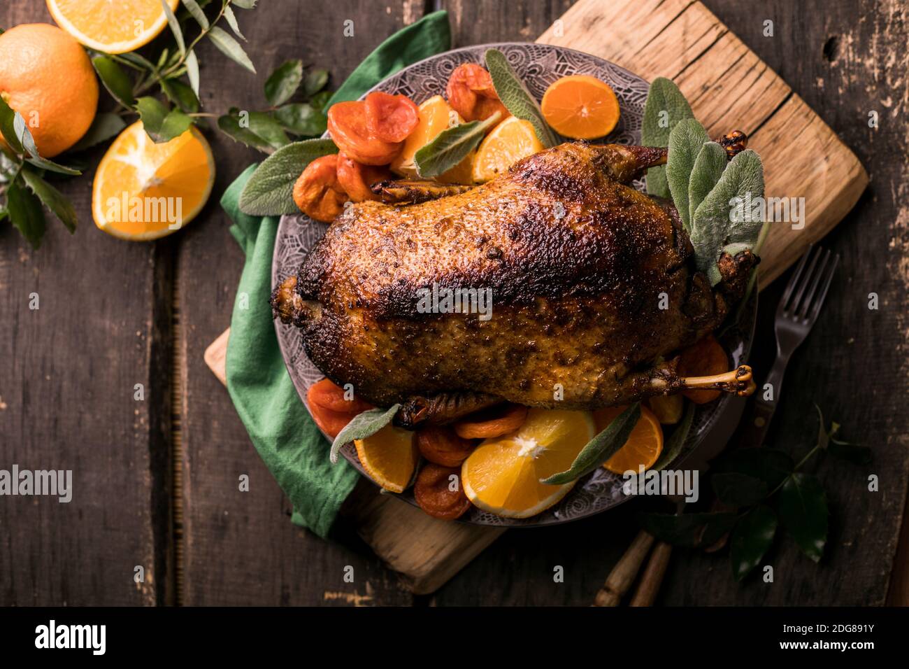 Winter Holiday table served for Christmas dinner with roasted duck