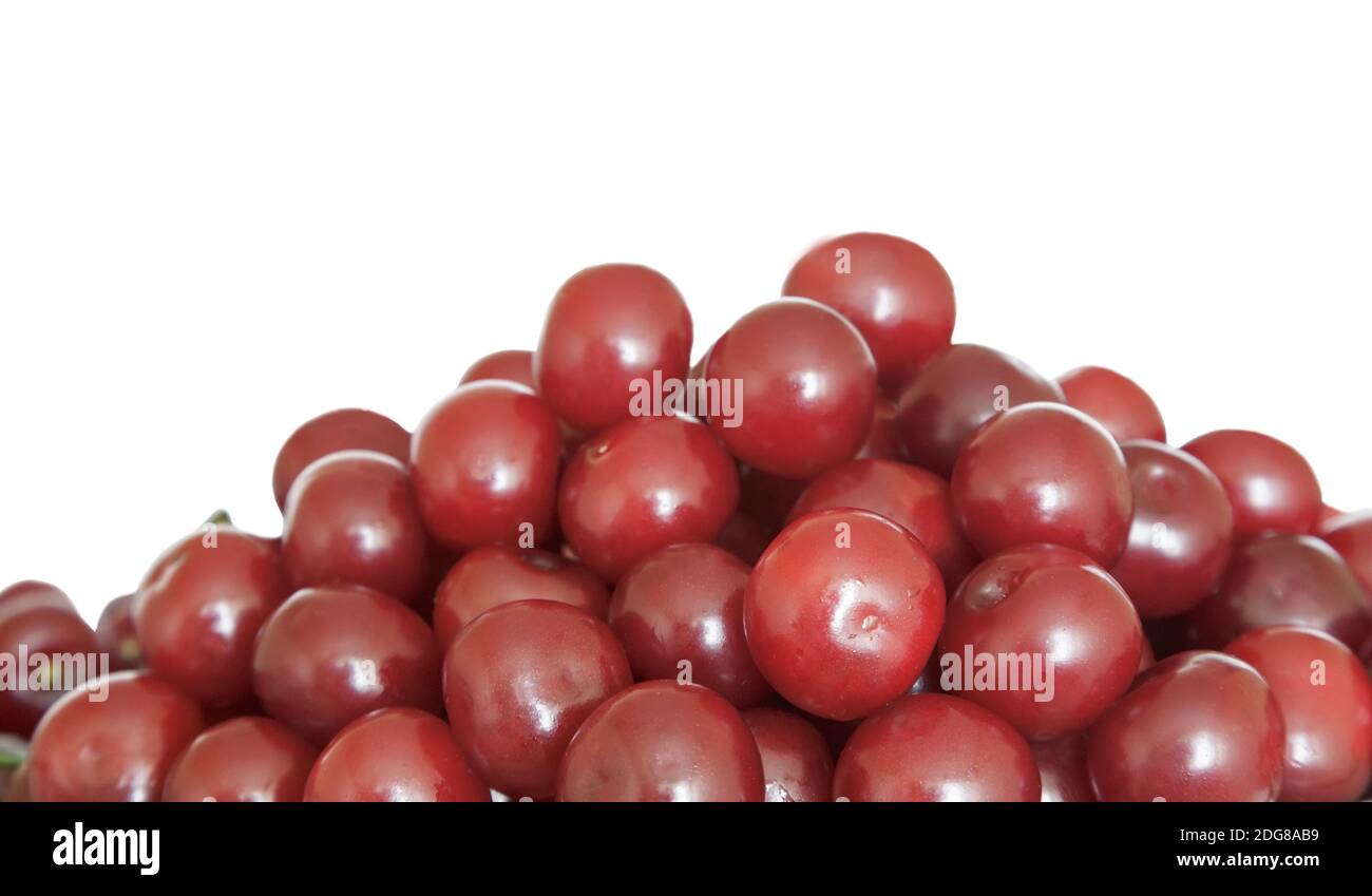Ripe cherries on a white background. Stock Photo