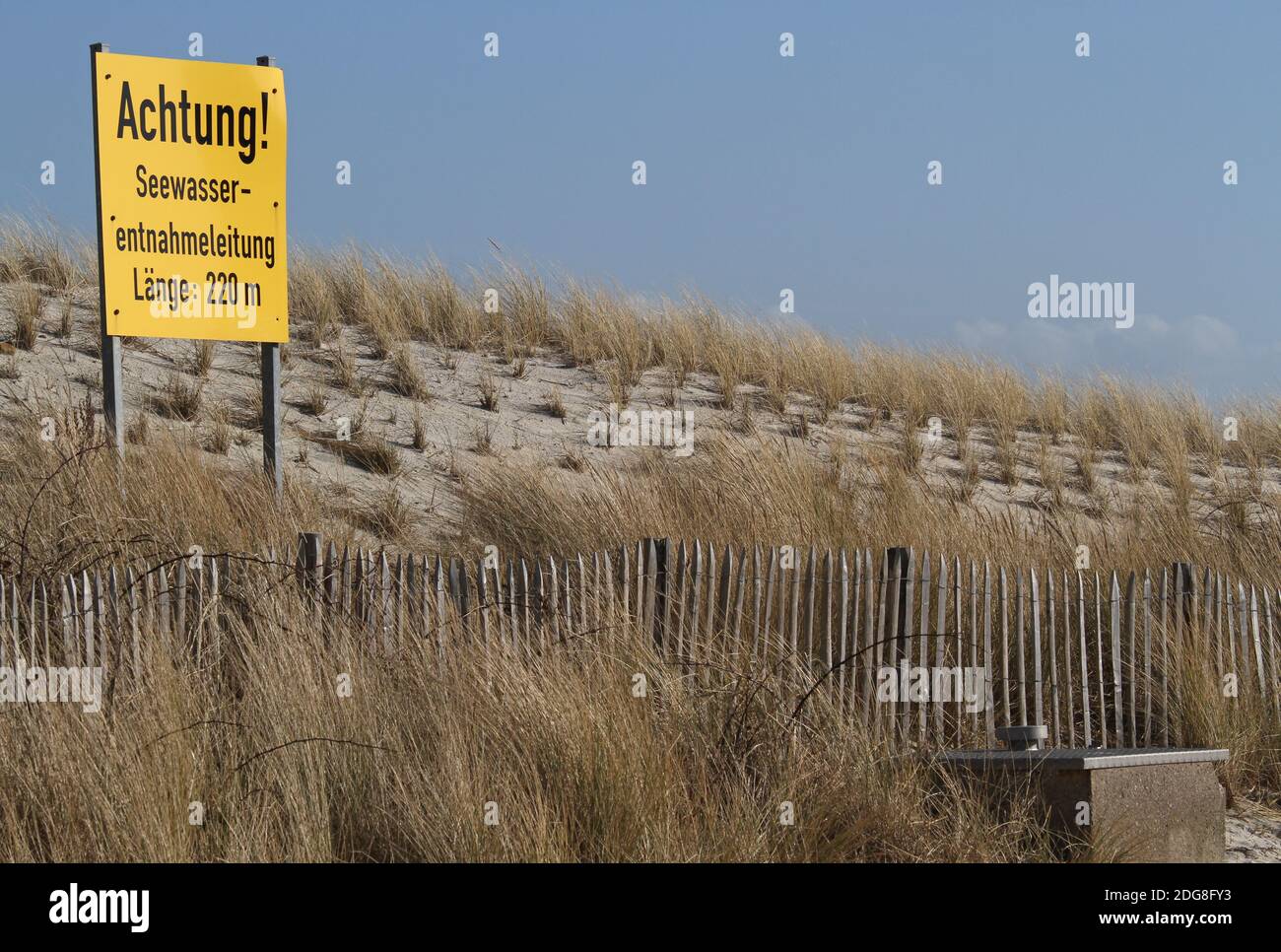 Sign in the dunes Stock Photo