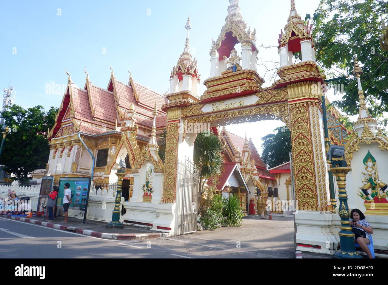 This Buddhist temple can be found just a long walking street of the Nakhon Phanom town. People usually pray here and give merit to the temple. Stock Photo