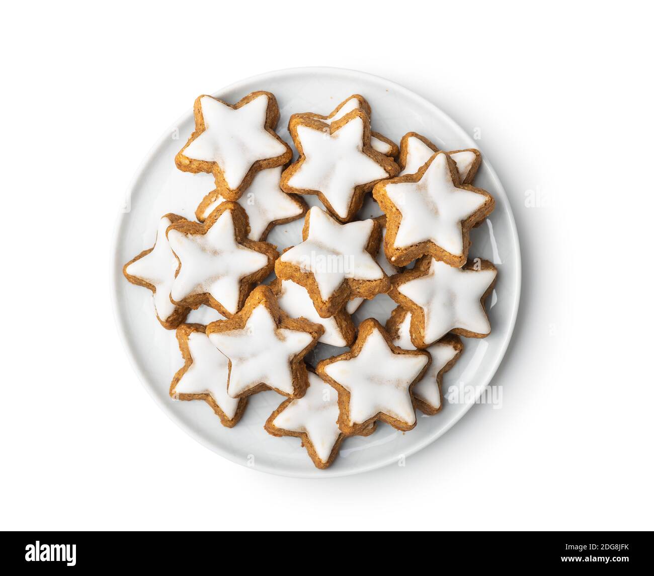 Icing gingerbread stars. Traditional Christmas cookies isolated on ...