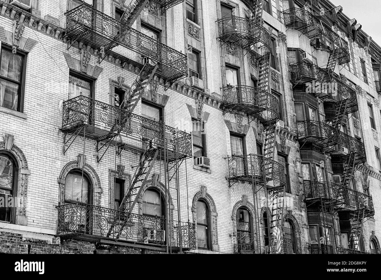 Fire escapes on buildings in Manhattan in black and white Stock Photo