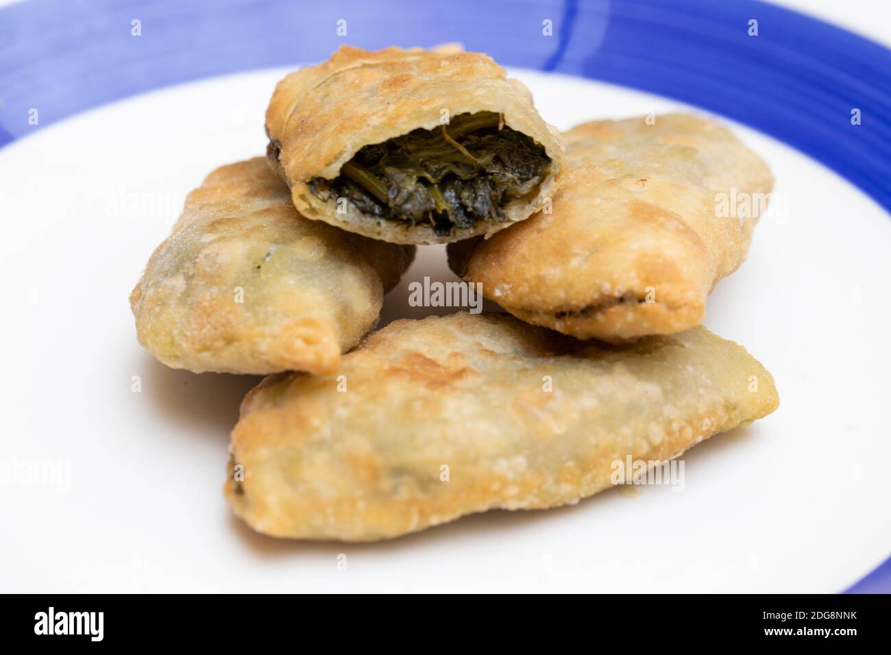 Traditional Cretan spinach pies or spinakipita, on a plate Stock Photo