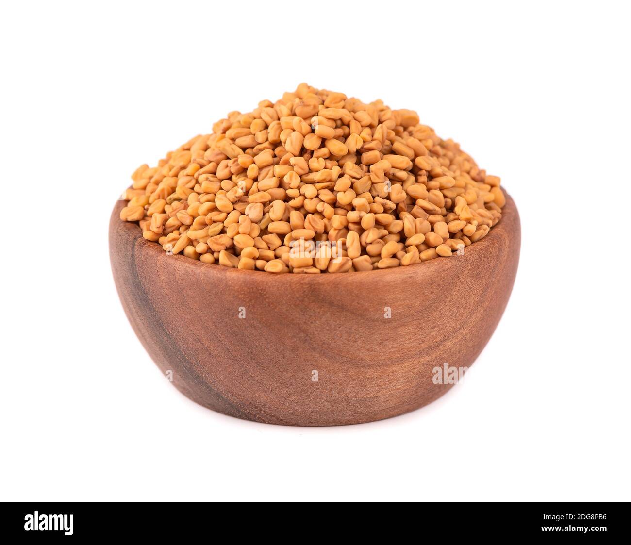 Helba Fenugreek seeds in wooden bowl, isolated on white background. Shambala ...